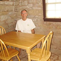 Dad in the dining area of the cabin